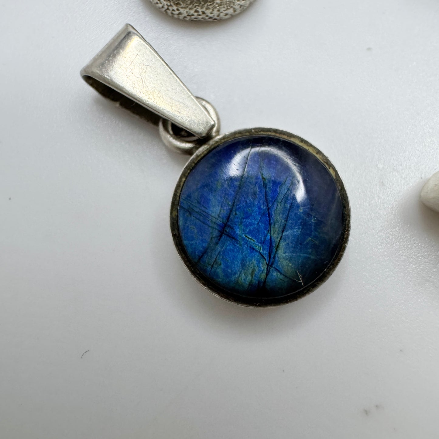 Finland. 4 Small Vintage Solid Silver Pendants.