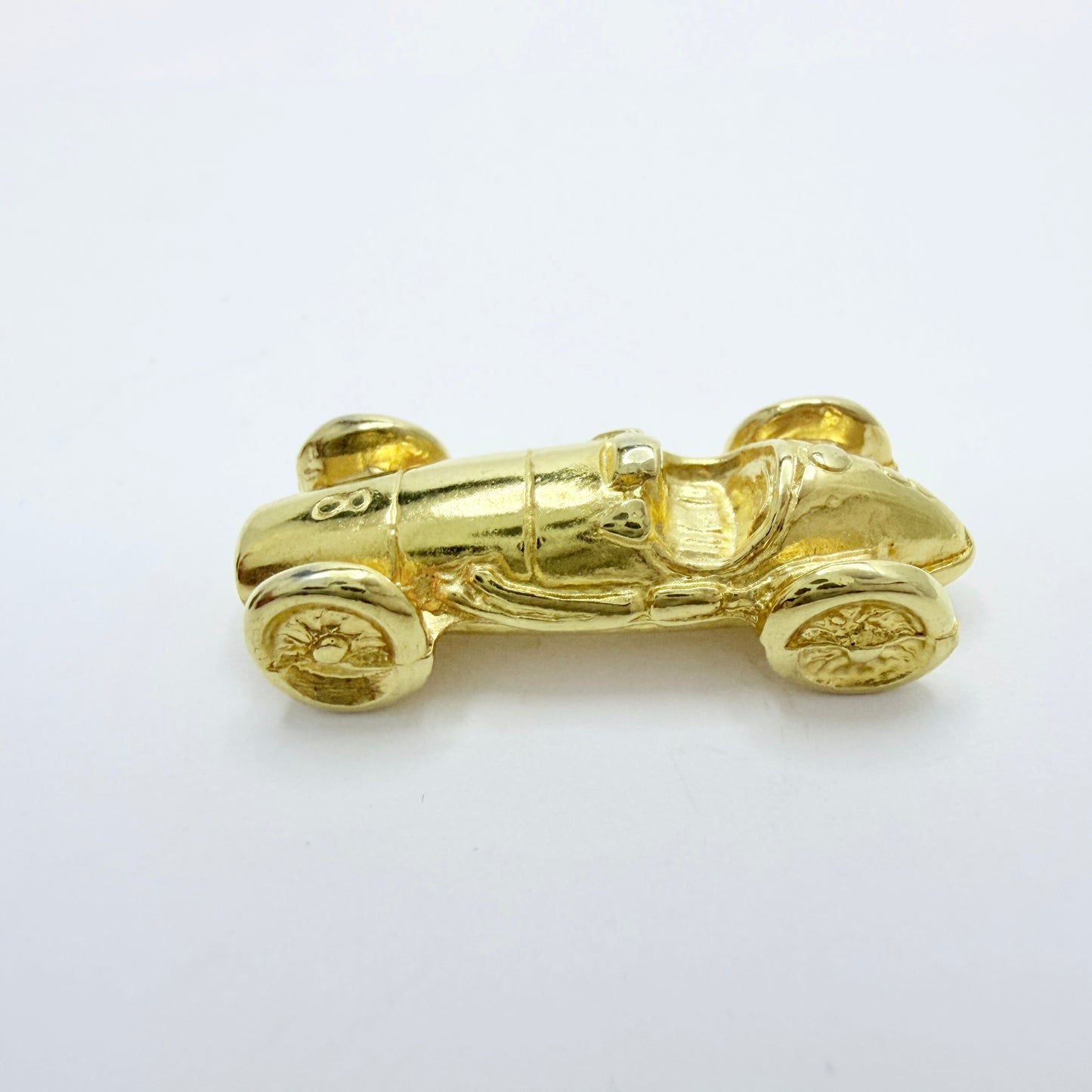 Maserati. Vintage Pin and Miniature Car.