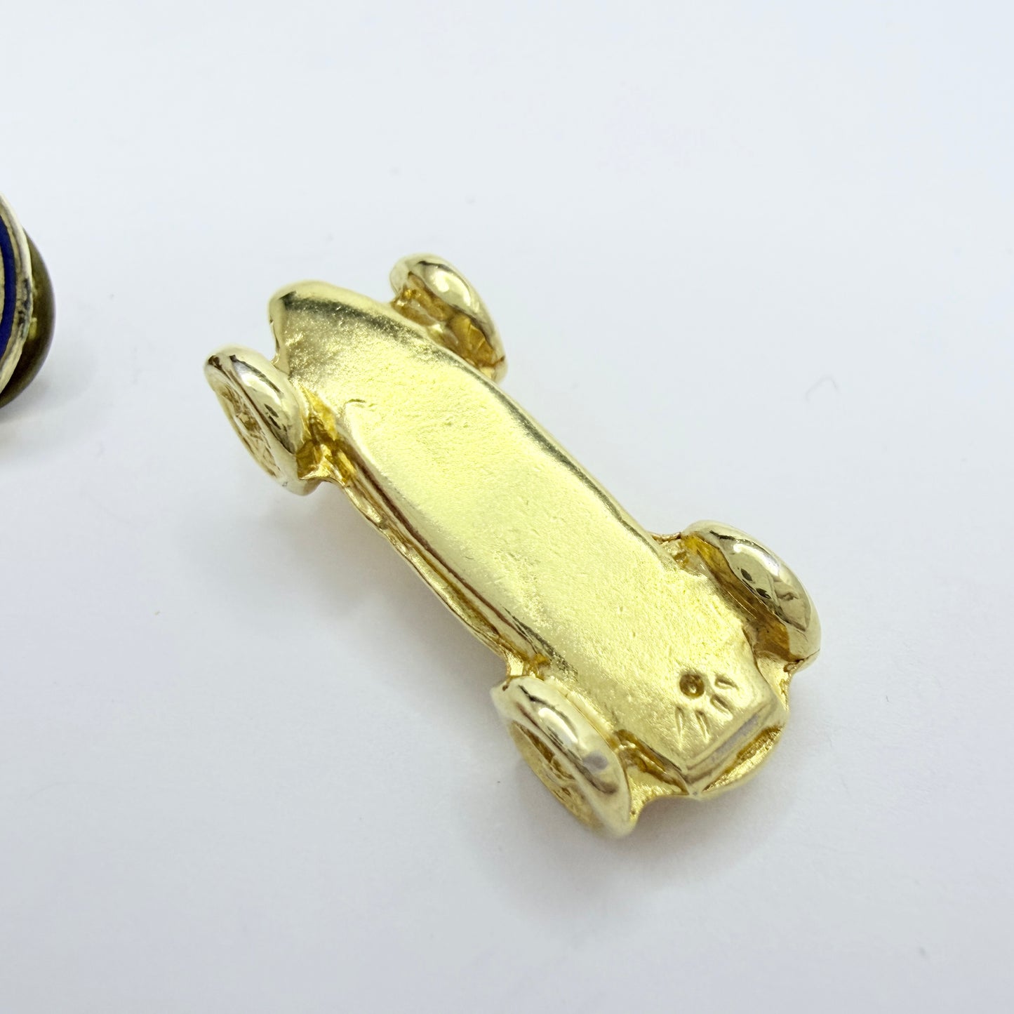 Maserati. Vintage Pin and Miniature Car.