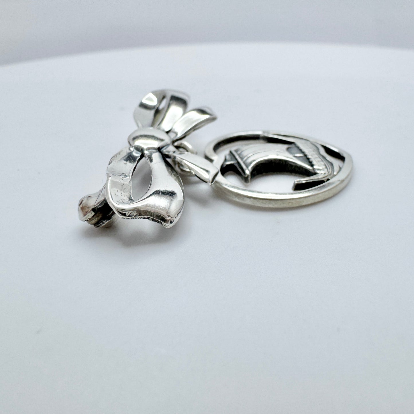 Carl Ove Frydensberg, Denmark 1950s. Vintage Silver Viking-ship Heart Ribbon Brooch.