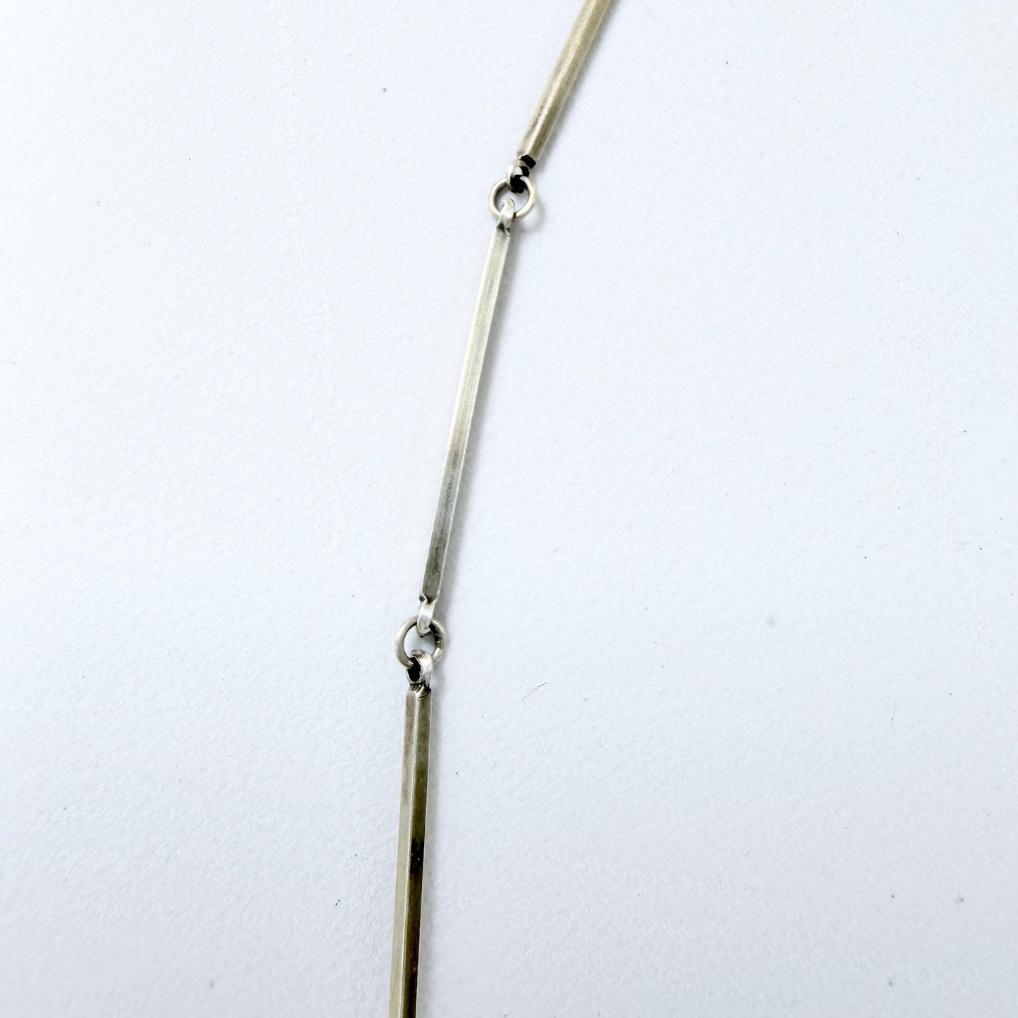CG Hallberg, Sweden 1913. Antique Silver Four-leaf clover Locket + Long Chain.
