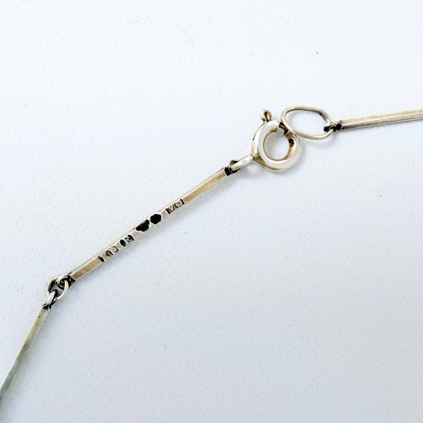 CG Hallberg, Sweden 1913. Antique Silver Four-leaf clover Locket + Long Chain.