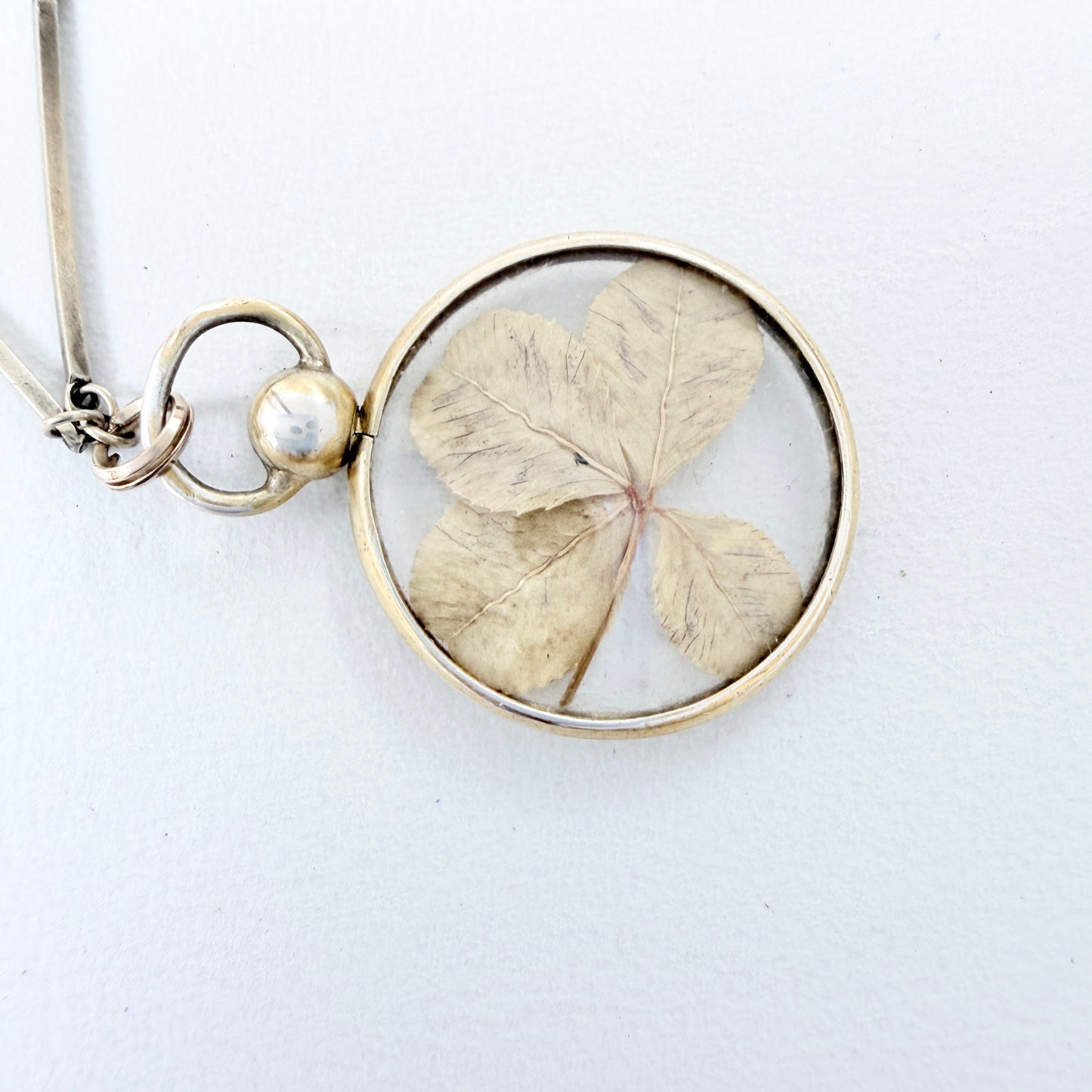 CG Hallberg, Sweden 1913. Antique Silver Four-leaf clover Locket + Long Chain.