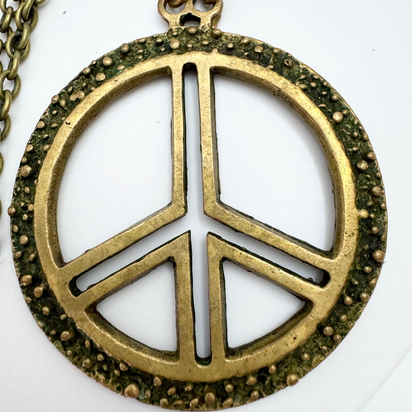 Scandinavia 1970s. Vintage Bronze Hippie Peace Sign Pendant Necklace.