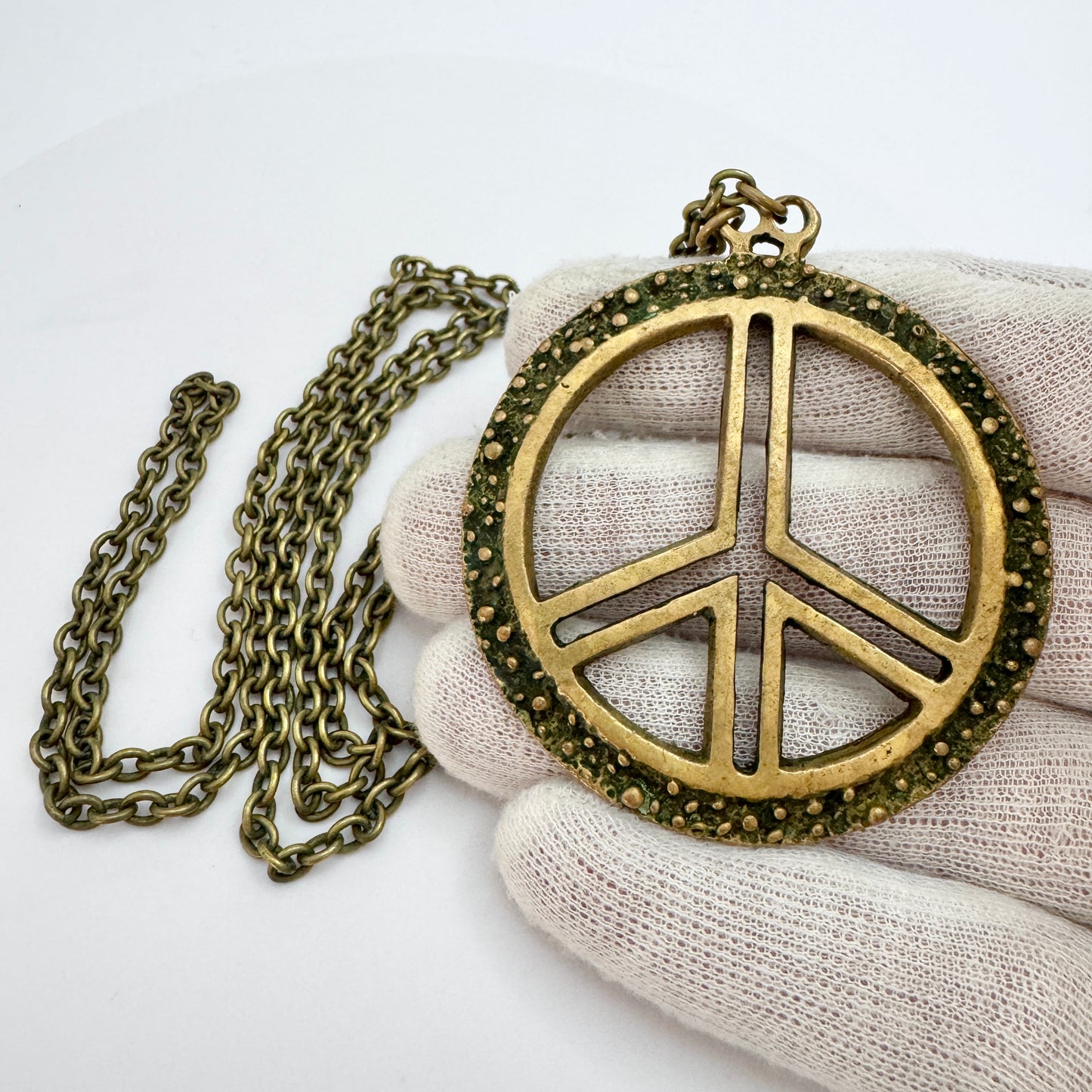 Scandinavia 1970s. Vintage Bronze Hippie Peace Sign Pendant Necklace.