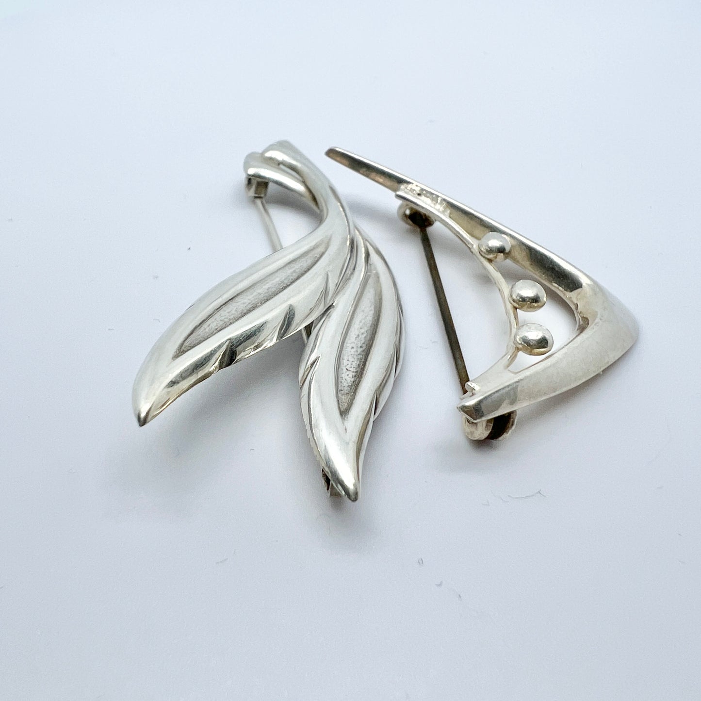 Finland 1950-60s. Two Solid Silver Brooches.