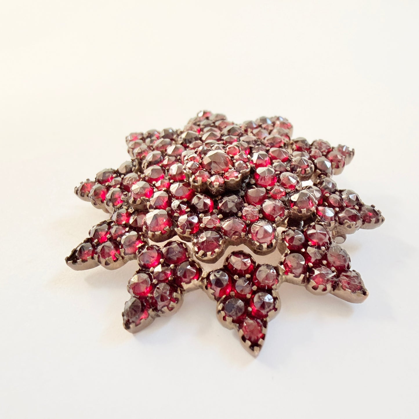Antique Bohemian Garnet Gilt Metal Star Brooch.