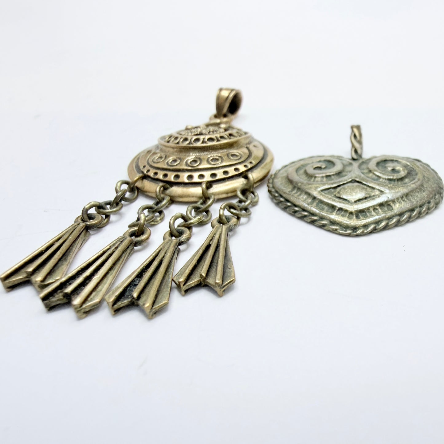 Two Vintage Scandinavian Bronze Pendants.