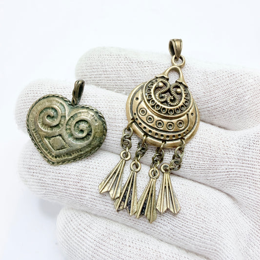Two Vintage Scandinavian Bronze Pendants.