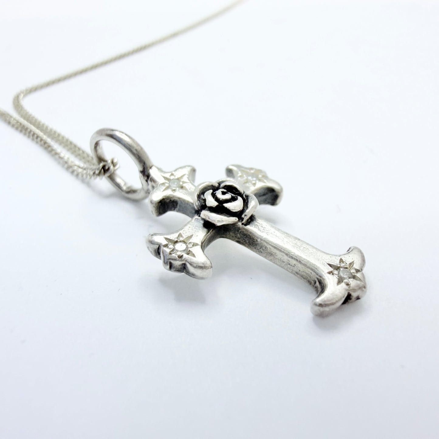 Catherine Michiels. Sterling Silver Diamond Cross Pendant Necklace.