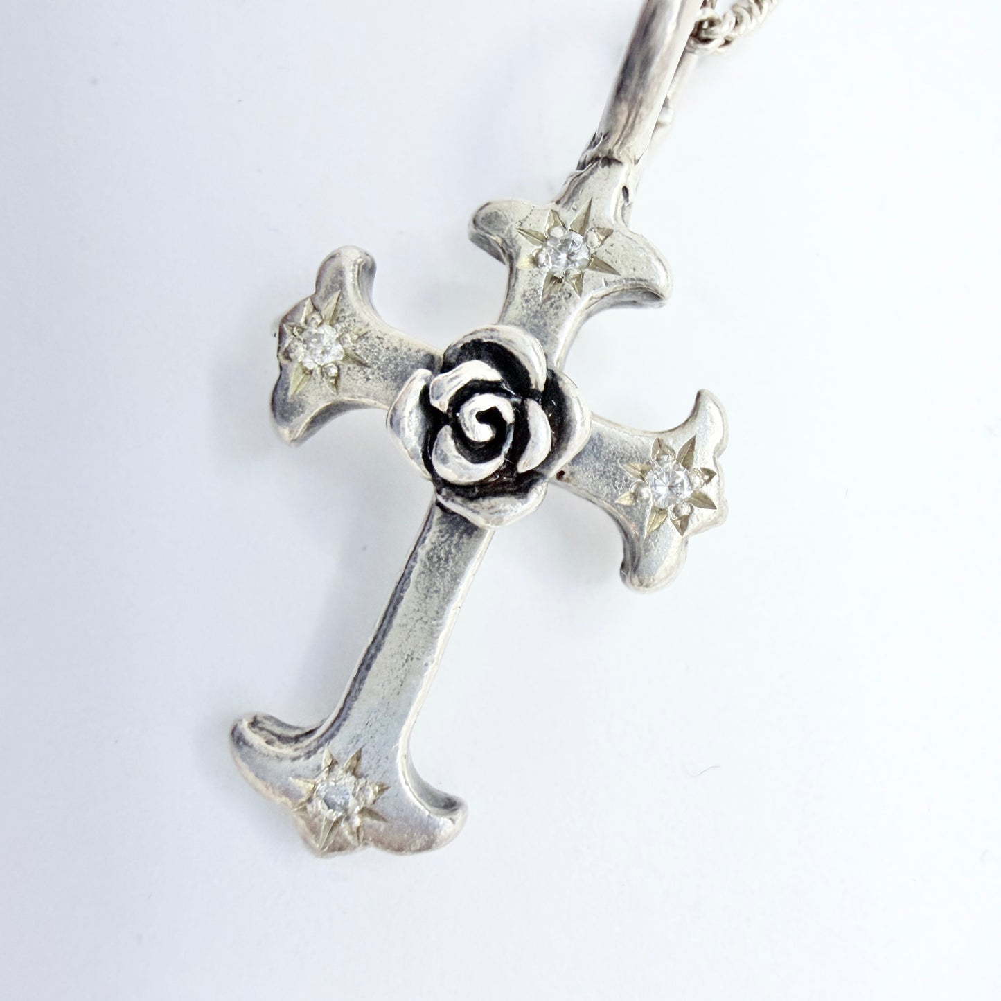 Catherine Michiels. Sterling Silver Diamond Cross Pendant Necklace.
