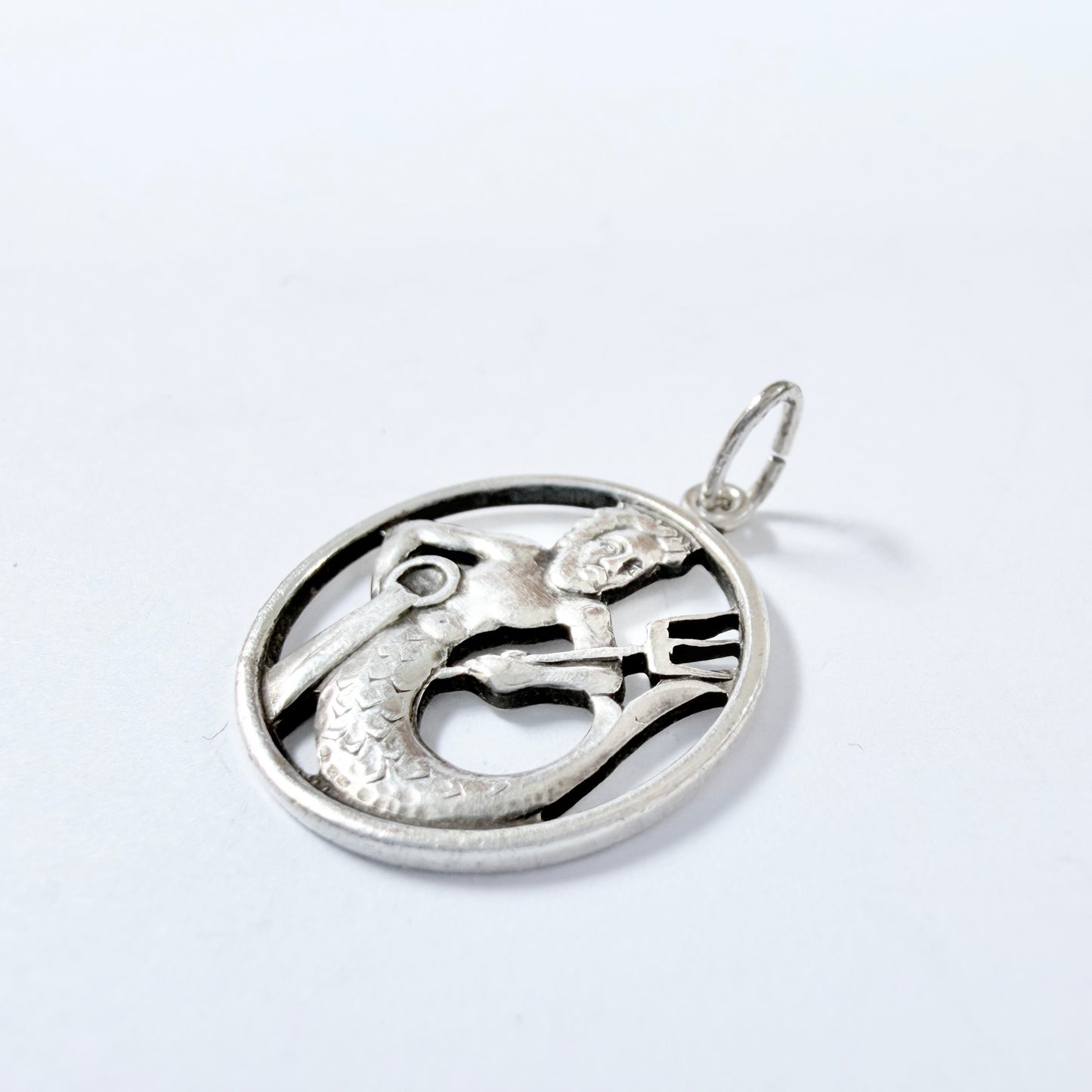 REU, Germany. Vintage Sterling Silver Zodiac Neptune Charm Pendant.