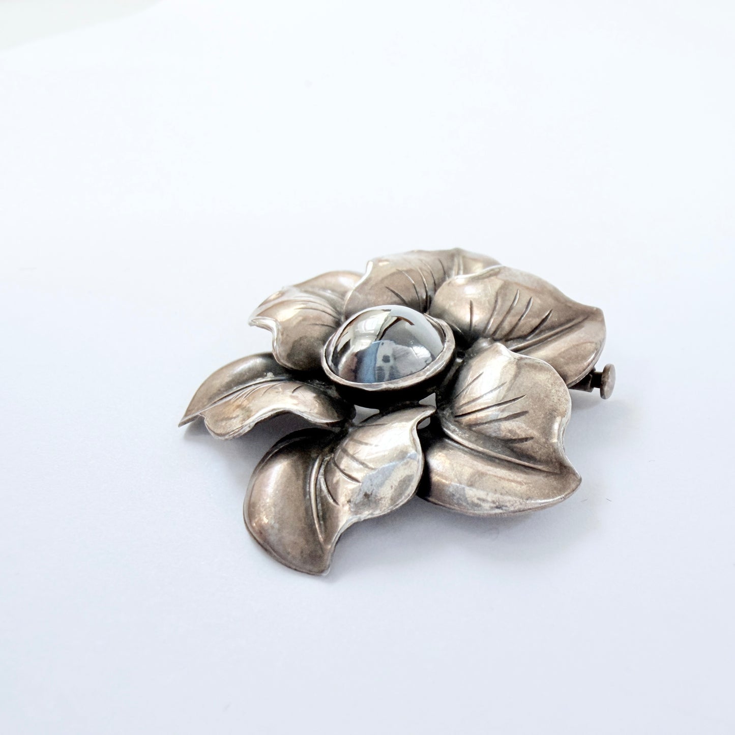 Kaplan, Sweden 1954. Vintage Solid Silver Hematite Flower Brooch.