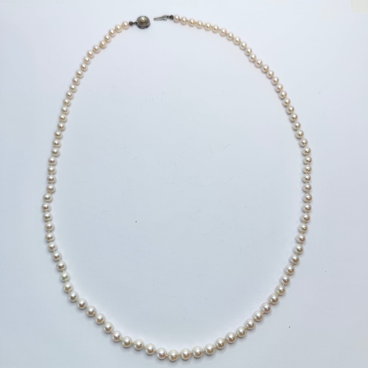 Vintage 1950s. Vintage 28 inch Cultured Pearl Silver Clasp Necklace.