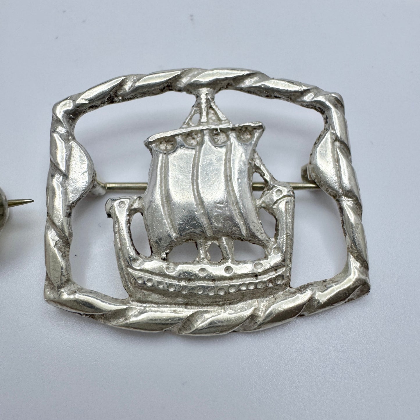 Two Vintage Scandinavian Solid Silver Viking Ship Brooches.
