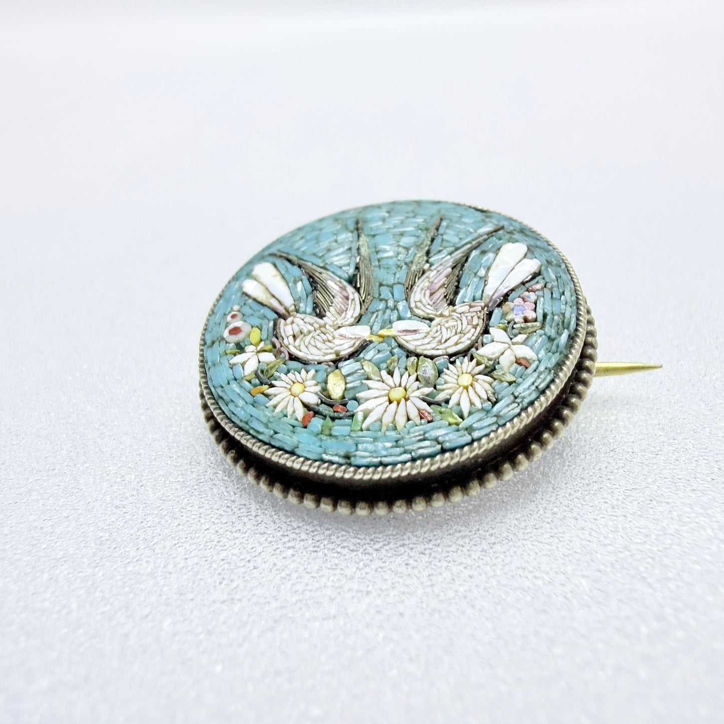 Hallmarked Italy ca year 1900. Antique Gilt Solid Silver Micro Mosaic Love Birds Brooch.