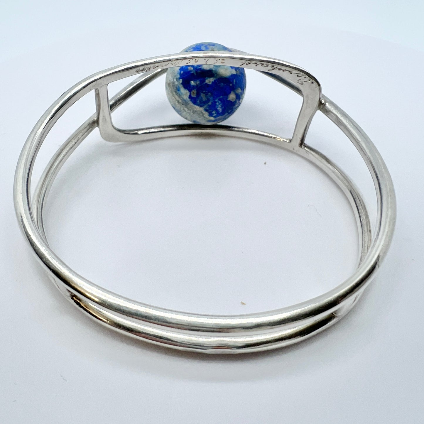 Germany/Austria 1960s. Solid 900 Silver Caged Kinetic Sodalite Ball Bangle Bracelet. Makers Mark.