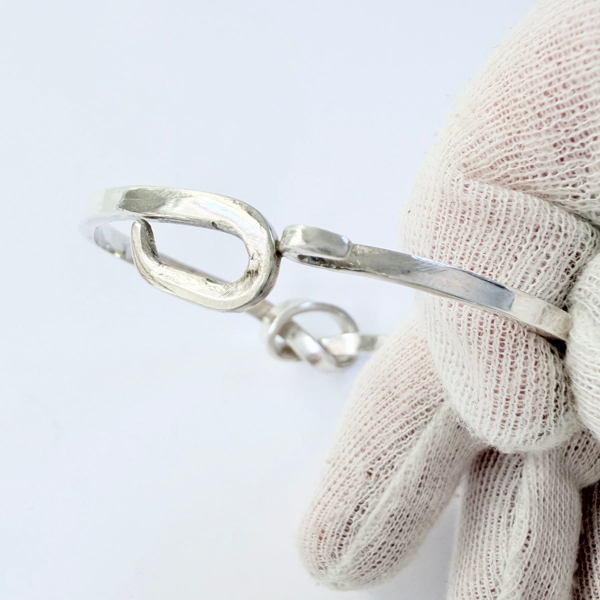 Dan Smedman, Sweden. Hand-wrought Sterling Silver Love Knot Bangle Bracelet.