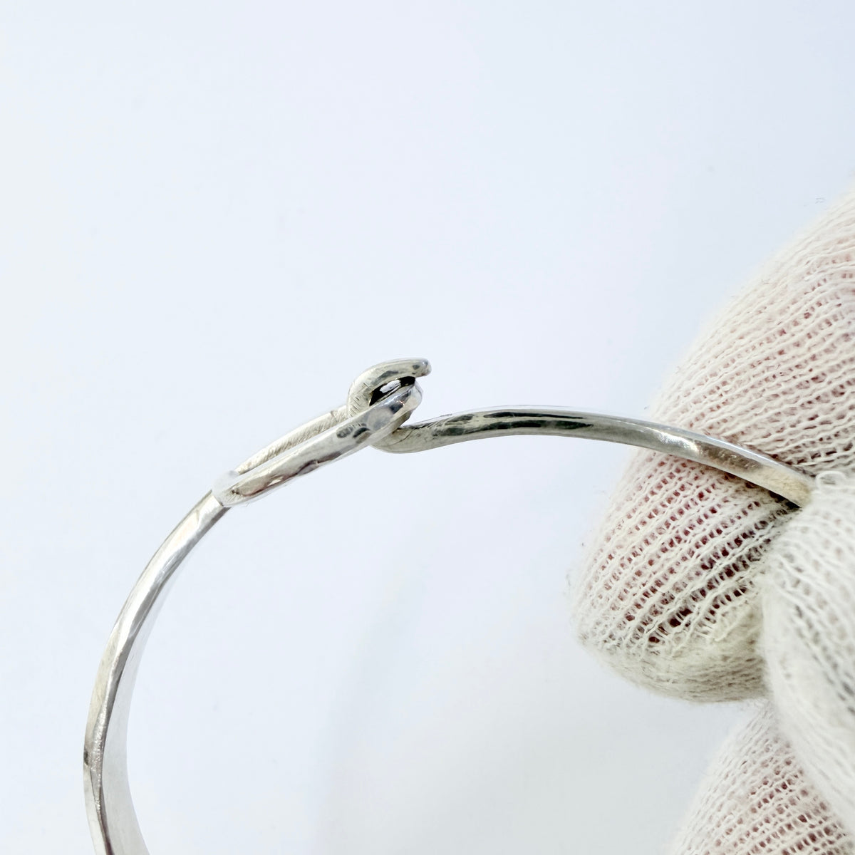 Dan Smedman, Sweden. Hand-wrought Sterling Silver Love Knot Bangle Bracelet.