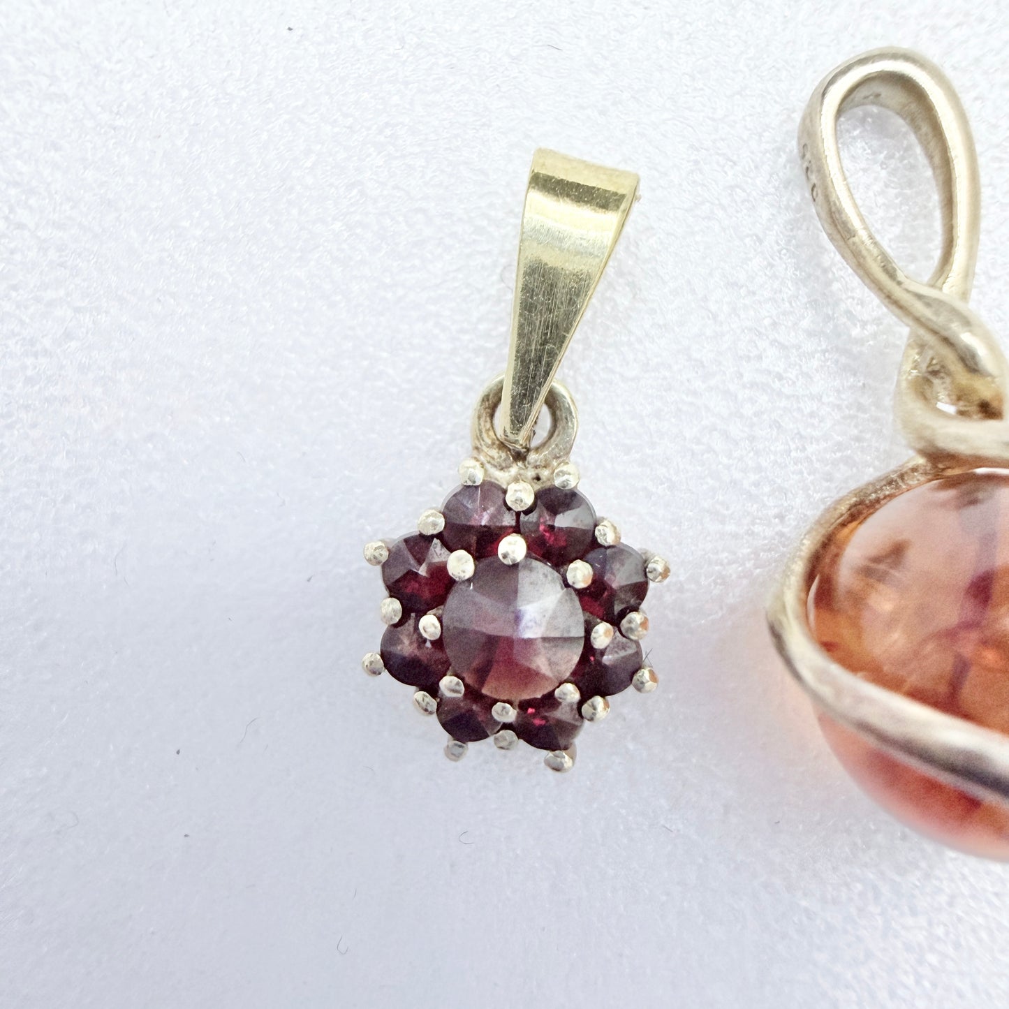 Two Vintage Small Sterling Silver Pendants. Garnets and Amber.