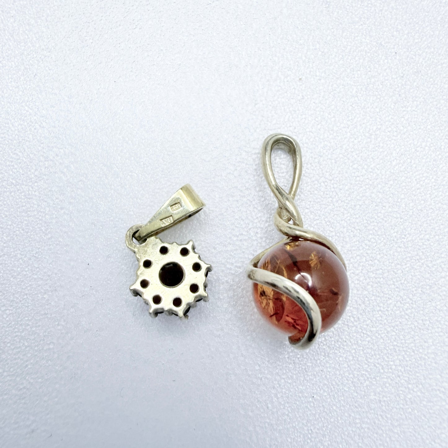 Two Vintage Small Sterling Silver Pendants. Garnets and Amber.