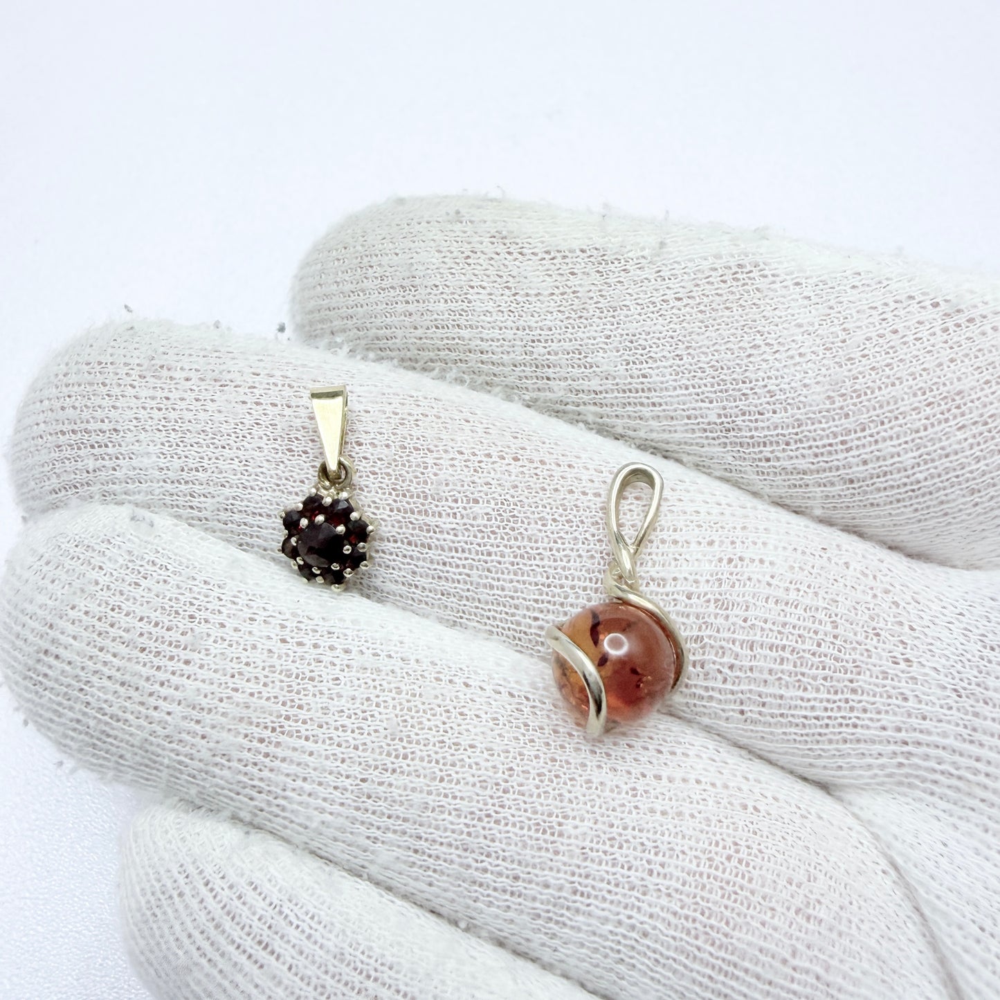 Two Vintage Small Sterling Silver Pendants. Garnets and Amber.