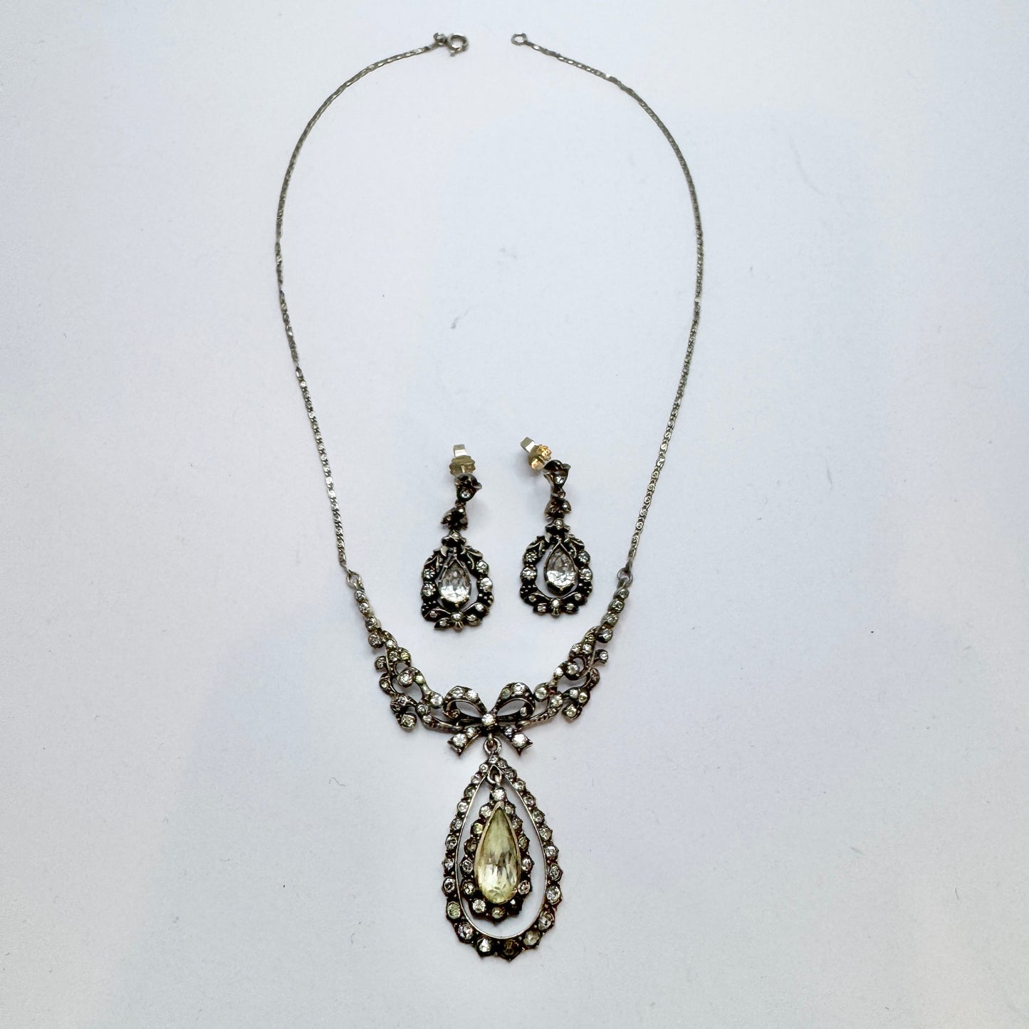 Early 1900s. Solid Silver Foil Back Paste Stone Necklace and Earrings.