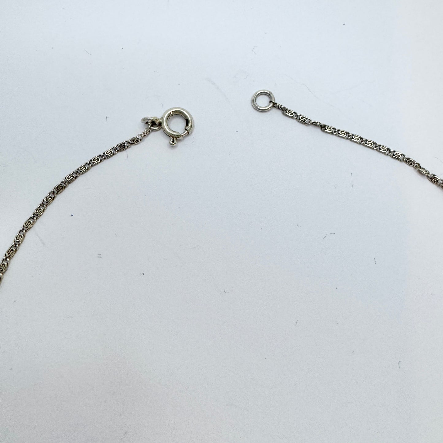 Early 1900s. Solid Silver Foil Back Paste Stone Necklace and Earrings.