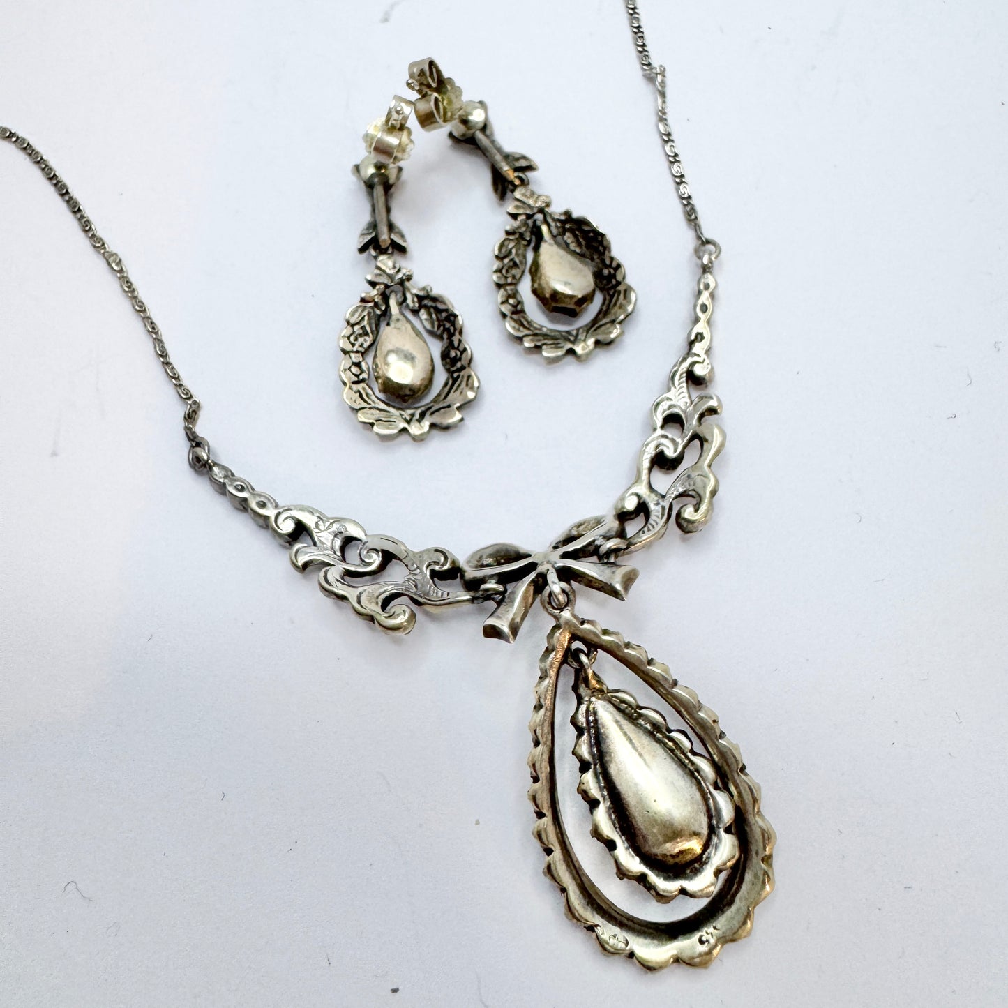 Early 1900s. Solid Silver Foil Back Paste Stone Necklace and Earrings.