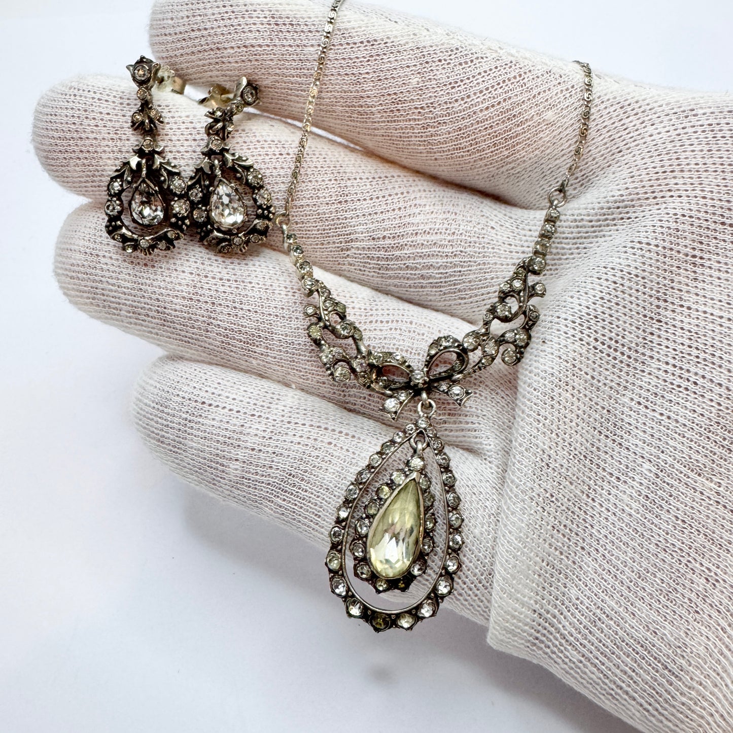 Early 1900s. Solid Silver Foil Back Paste Stone Necklace and Earrings.