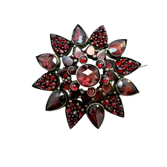 Early 1900s. Vintage Bohemian Garnet Gilt Metal Brooch.