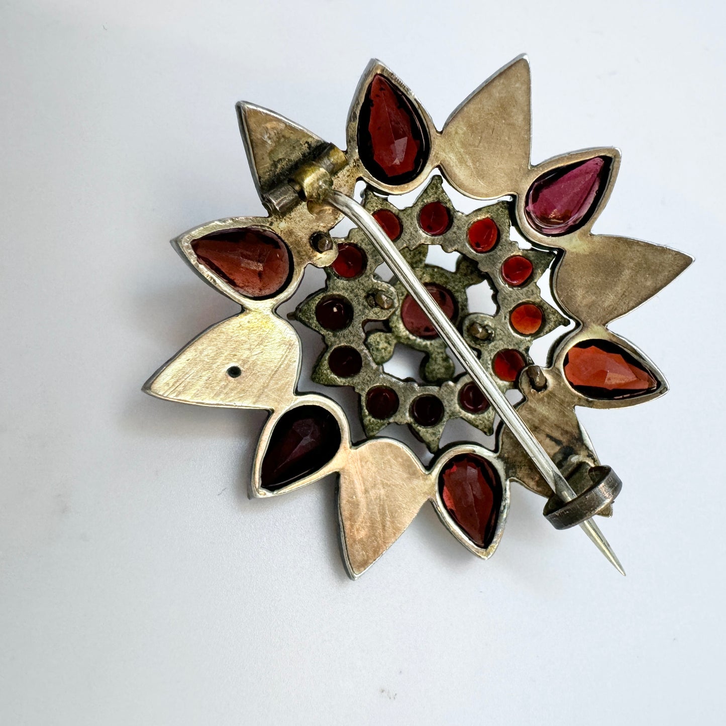 Early 1900s. Vintage Bohemian Garnet Gilt Metal Brooch.