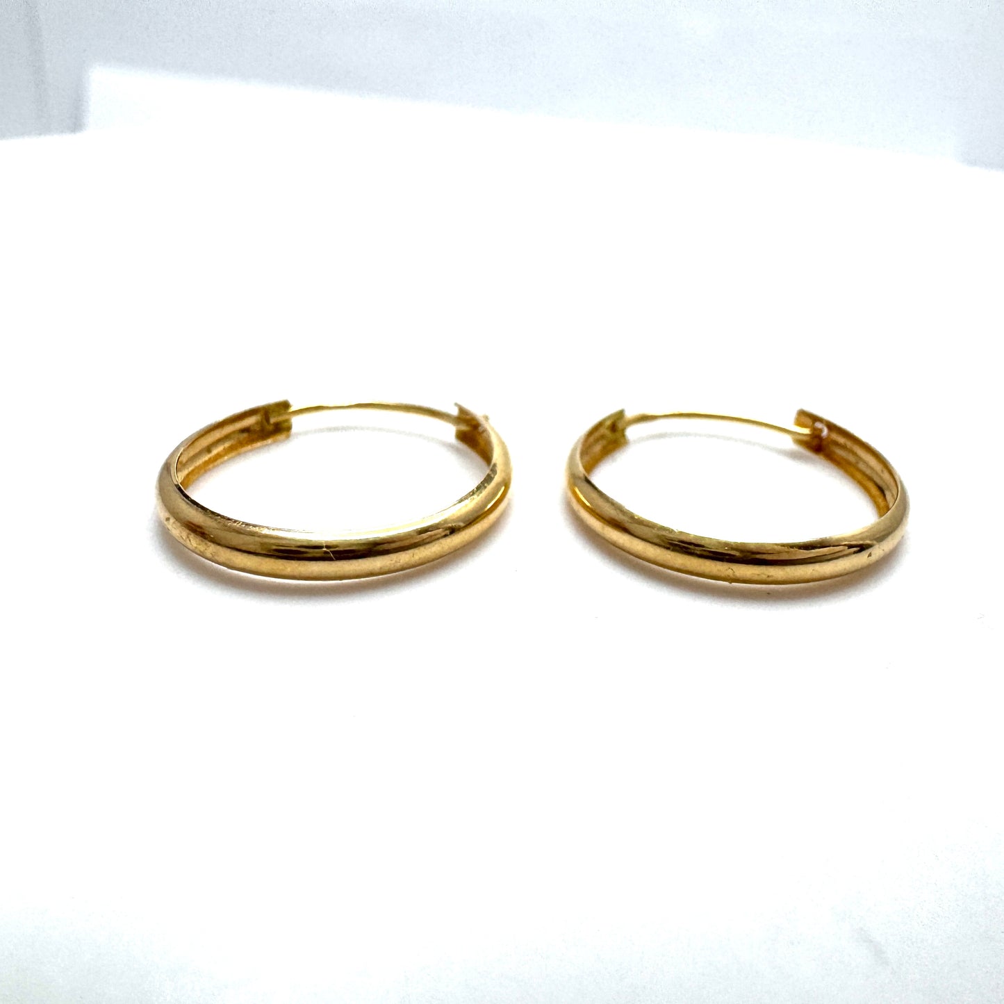 18k Gold Hoop Earrings.