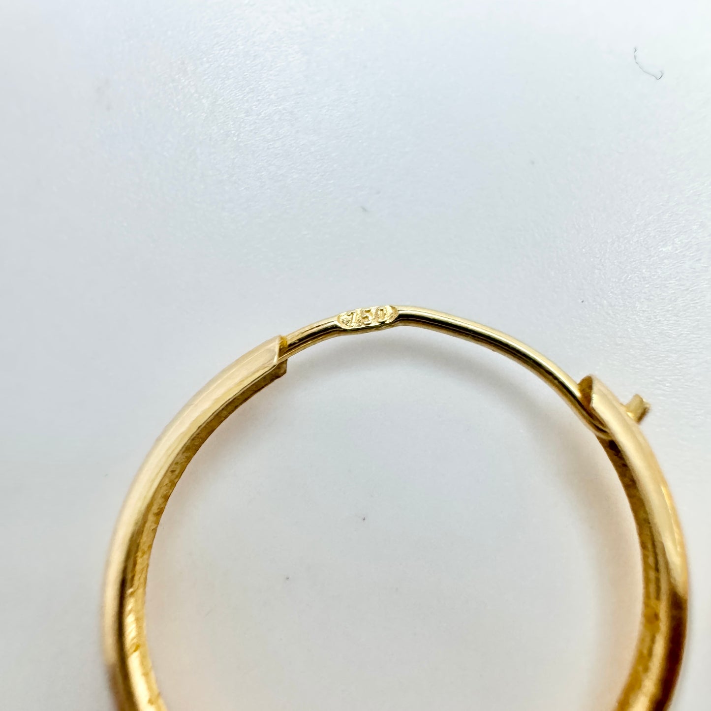 18k Gold Hoop Earrings.
