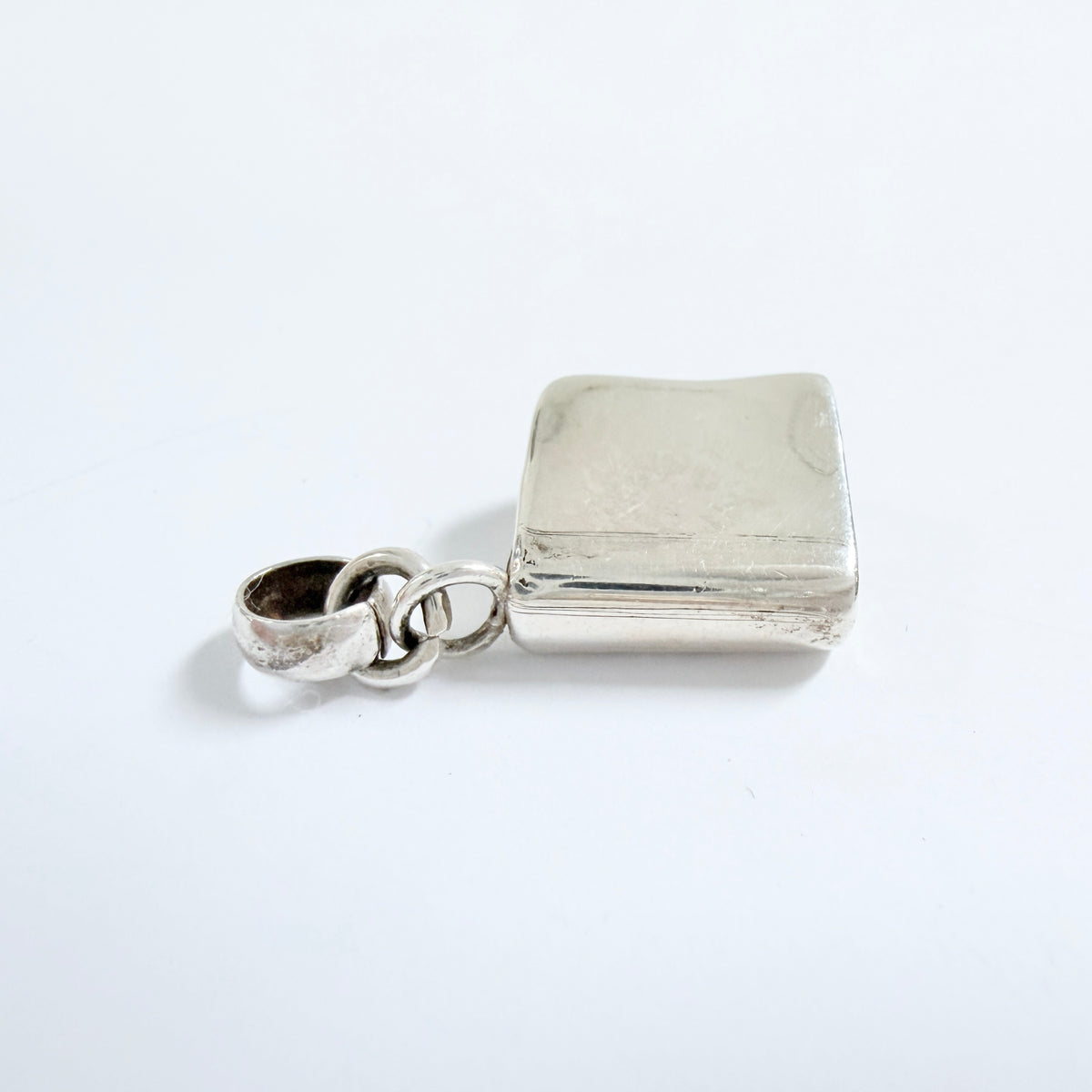 Karin Ferner, Sweden 1993. Vintage Sterling Silver Book Pendant. Signed.