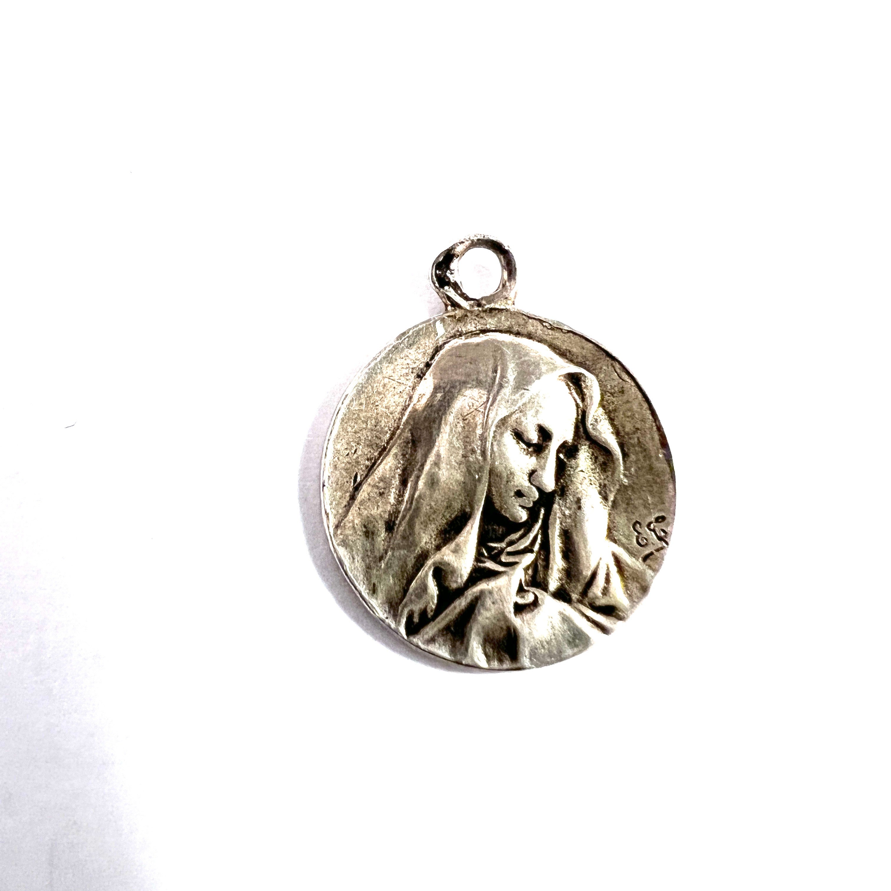 France Early 1900s. Solid Silver Madonna Charm. Signed.