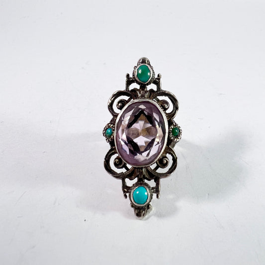 USA, Arts and Crafts Era. Sterling Silver Amethyst Turquoise Ring. Makers Mark.