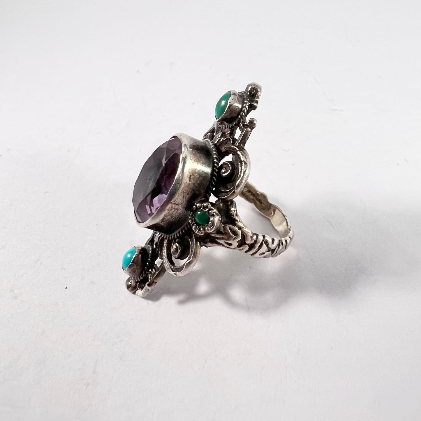 USA, Arts and Crafts Era. Sterling Silver Amethyst Turquoise Ring. Makers Mark.