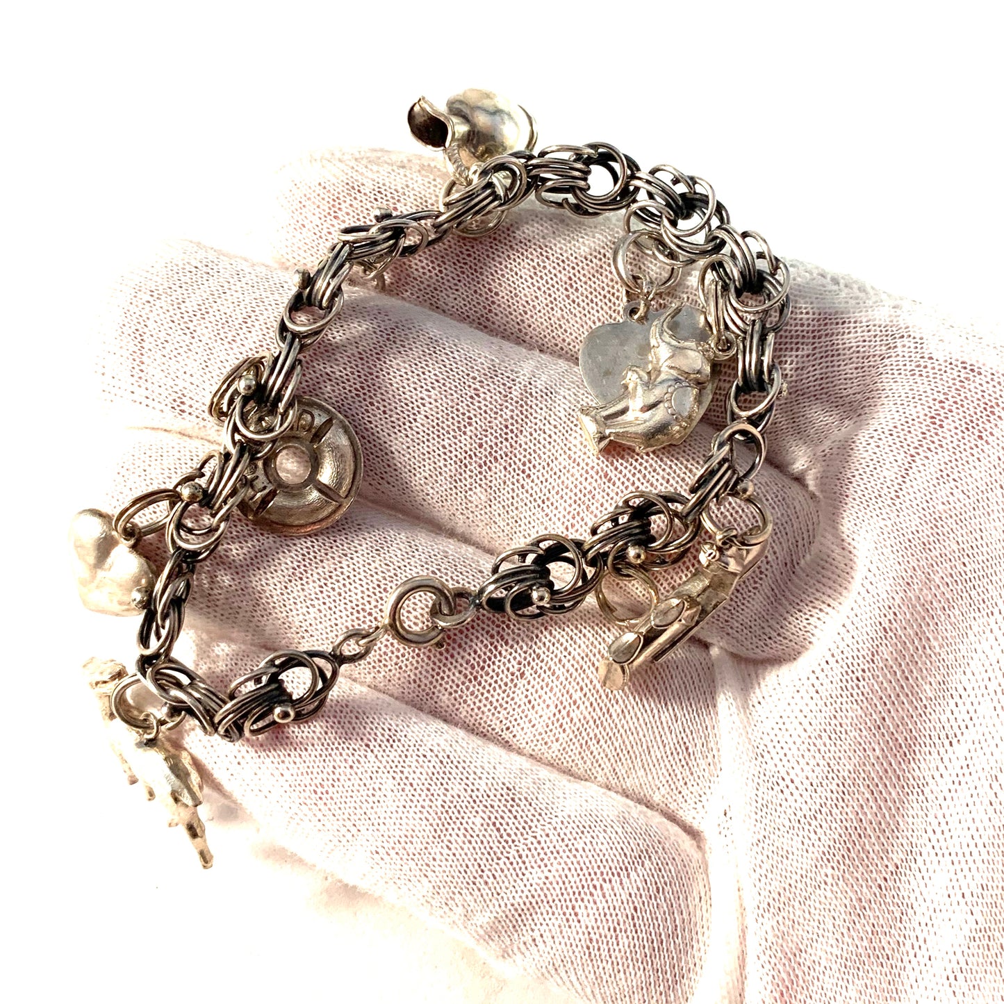 Einari Ailio, Finland Vintage 1960s Solid Silver Charm Bracelet.