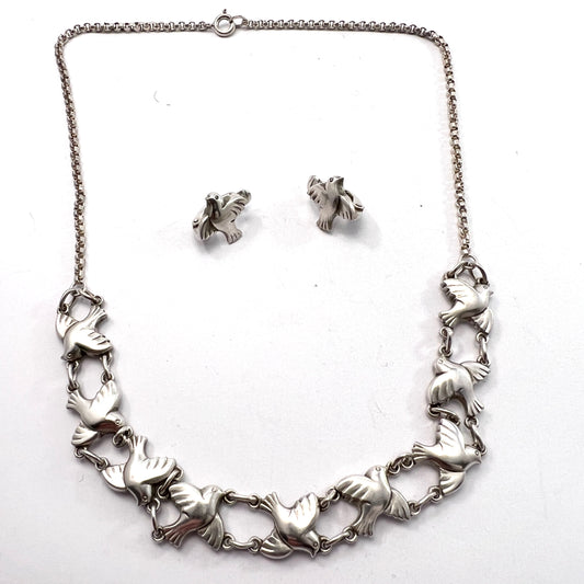Emil Snedker, Copenhagen 1918-37. Sterling Silver Peace Dove Necklace and Earrings.