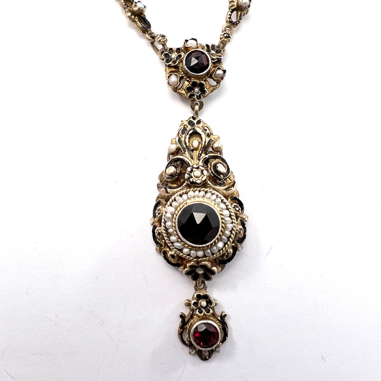 Austria-Hungary early 1900s. Antique Arts and Crafts Gilt 830 Silver Garnet Seed Pearl Enamel Necklace