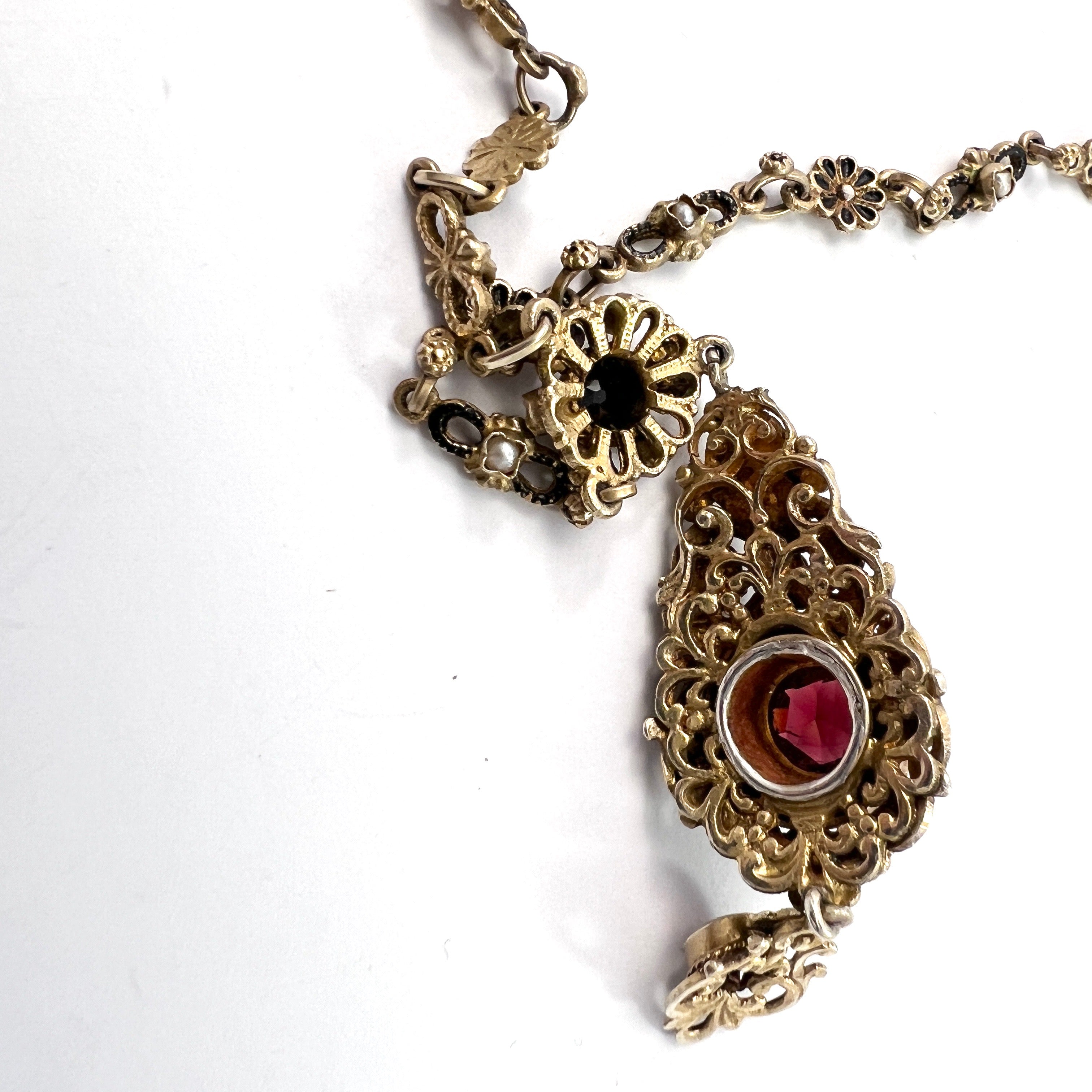 Austria-Hungary early 1900s. Antique Arts and Crafts Gilt 830 Silver Garnet Seed Pearl Enamel Necklace