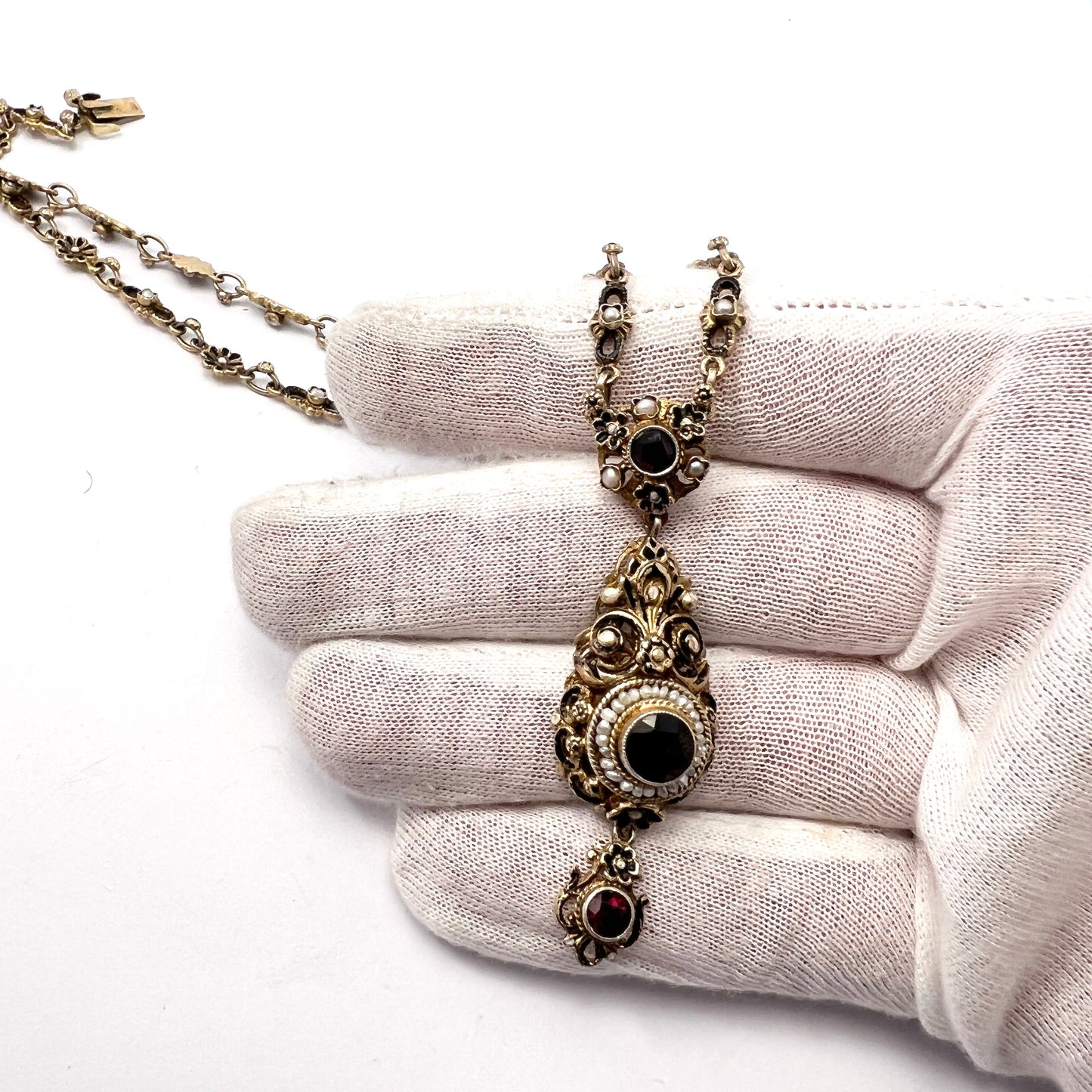 Austria-Hungary early 1900s. Antique Arts and Crafts Gilt 830 Silver Garnet Seed Pearl Enamel Necklace