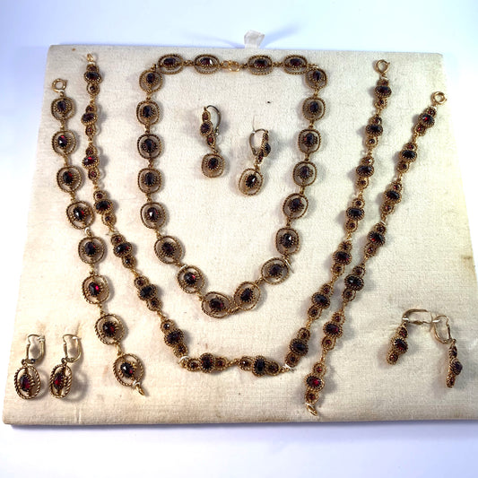 Extremely Rare Mid 1900s Full Display of Bohemian Garnet Jewelry.