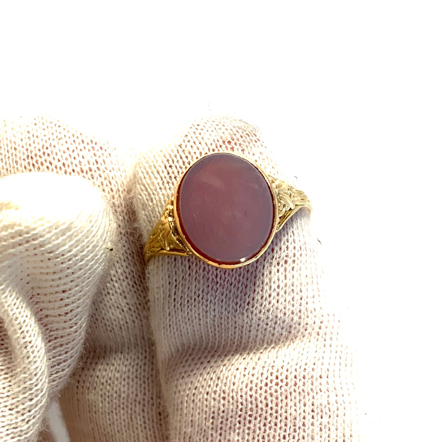 Early to mid 1900s. 18k Gold Carnelian Signet Ring.