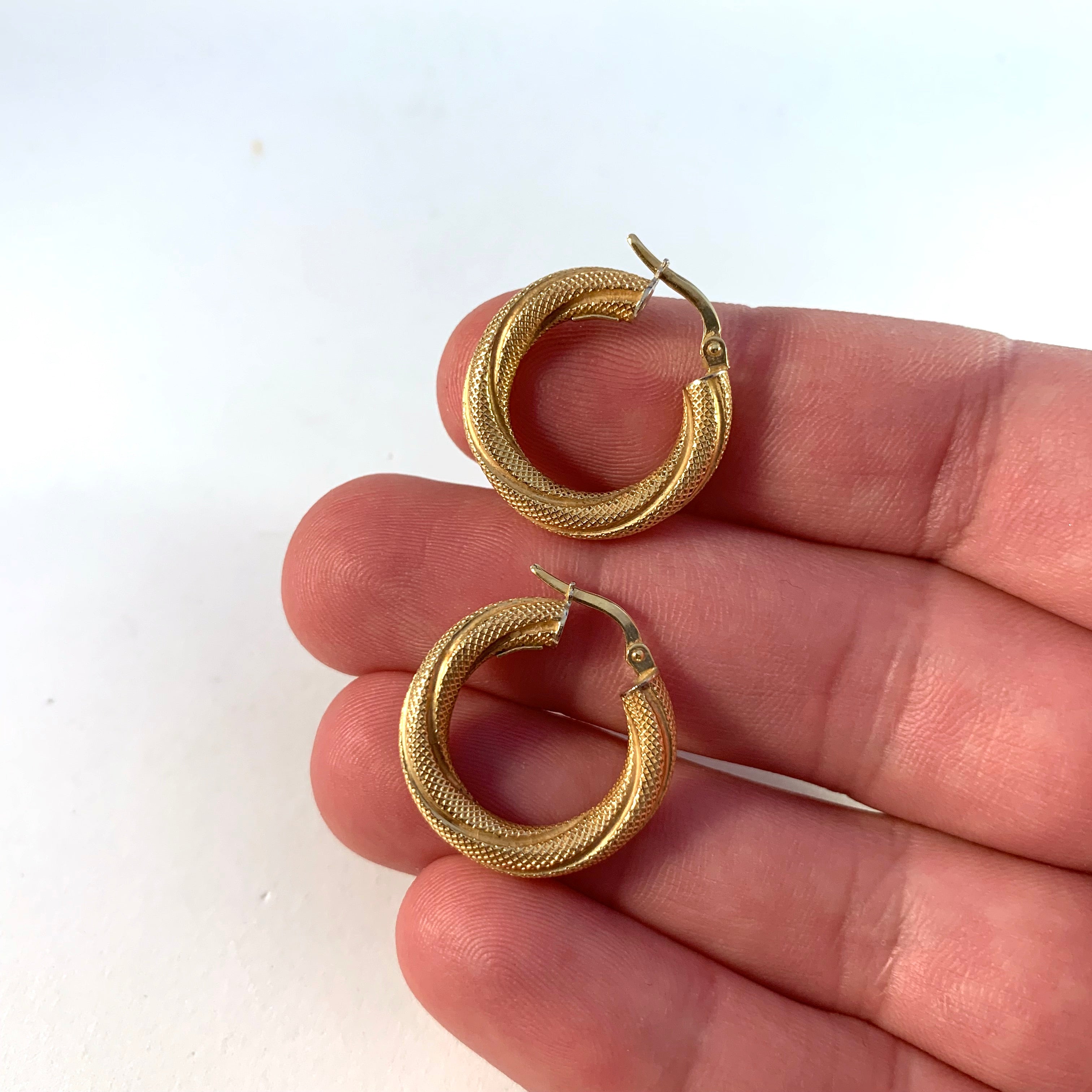 Uno A Erre, Arezzo Italy Vintage 18k Gold Huggie Earrings. Also marked BREV.