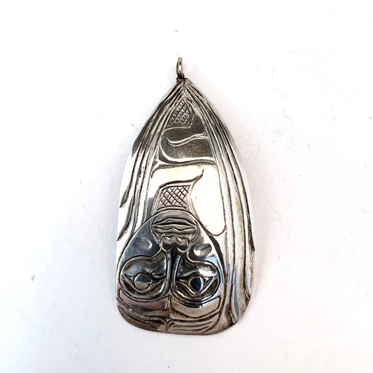 Maker W.P, Haida Canada 1987. Vintage Sterling Raven & Human Pendant.