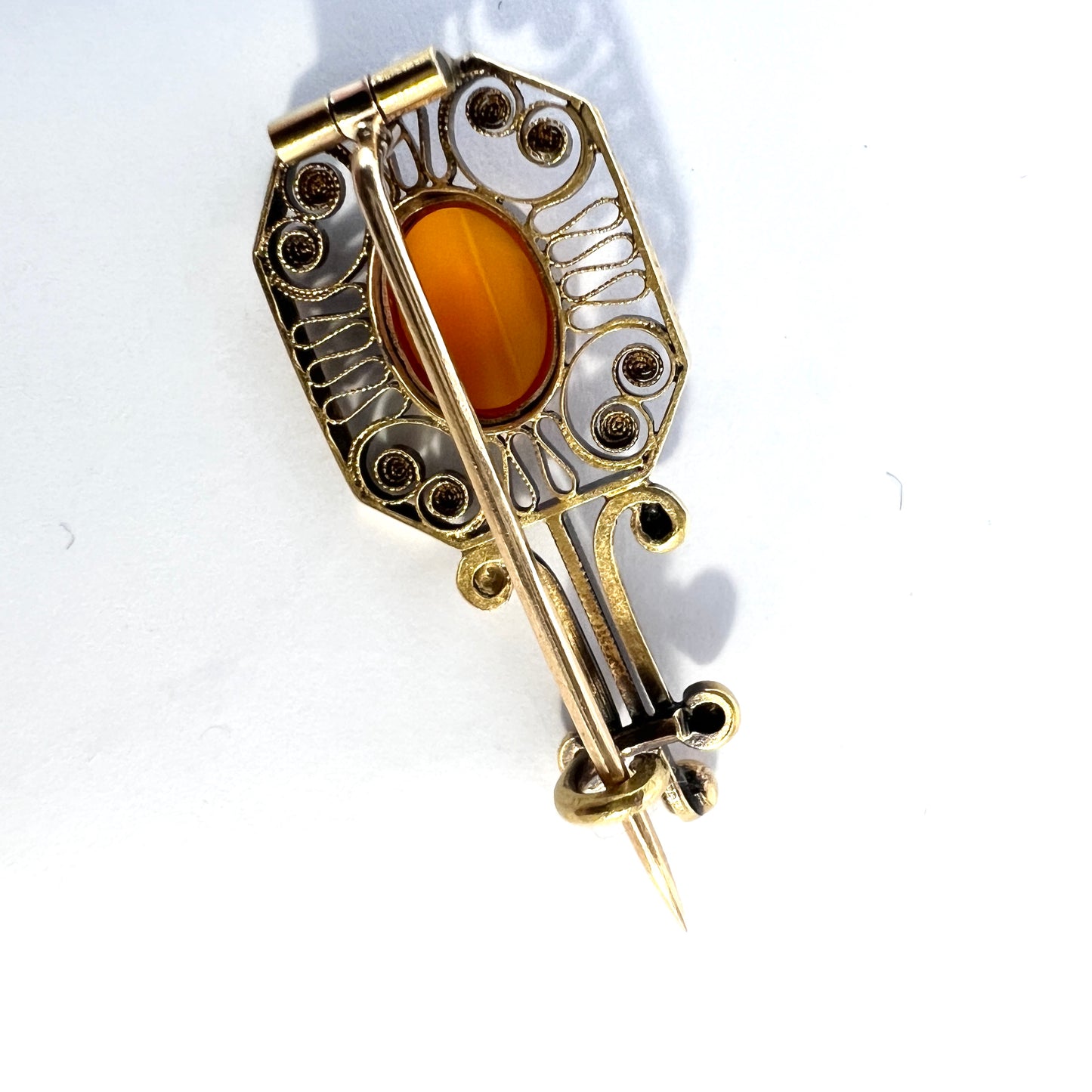 Bernhard Hertz, Sweden 1910. Antique 18k Gold Carnelian Halley's Comet Brooch.