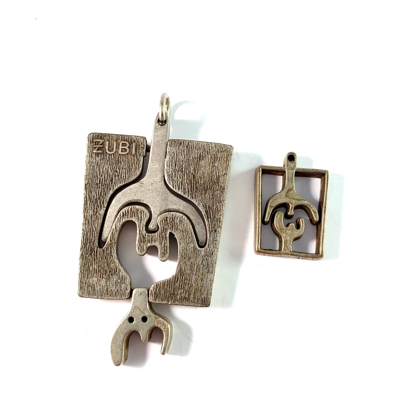 Francisco Baron, Spain 1970s. Vintage Numbered Metal ZUBI Pendant and Charm.