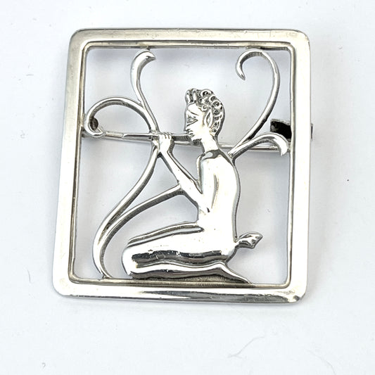 Bernhard Hertz, Copenhagen c 1920-30s. Art Deco Silver Faun with Flute Brooch.